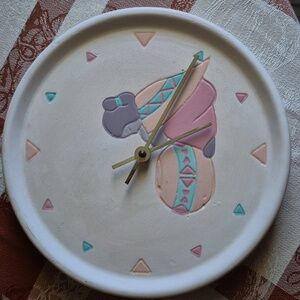 Artistic Wall Clock with Pastel Accents